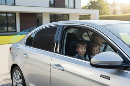 Magnetic car side window sun shade installed on a modern sedan blocking sunlight